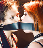 Two redheads roped and gagged together