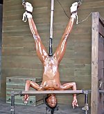 Hanged upside down, pussy-dildoed, face-fucked